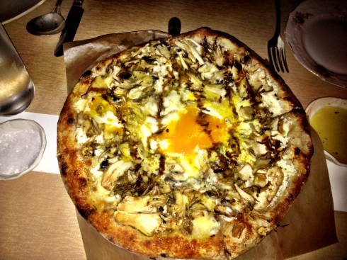 Mushroom and farm egg  pizza at ABC Kitchen in Union Square, Manhattan.