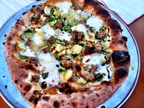Brussels sprouts, fennel, fontina, sausage, and spicy honey pizza at Fornino in Brooklyn Bridge Park.