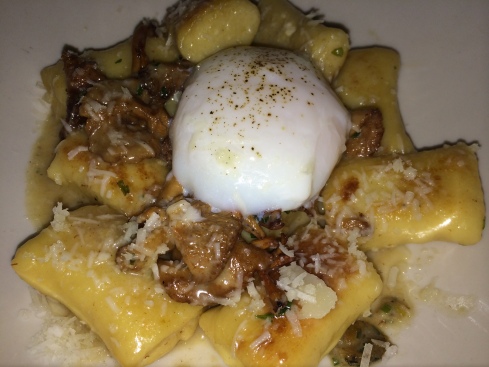 Ricotta gnocchi with mushrooms, poached egg, and truffled parmesan broth at Anella in Greenpoint, Brooklyn.